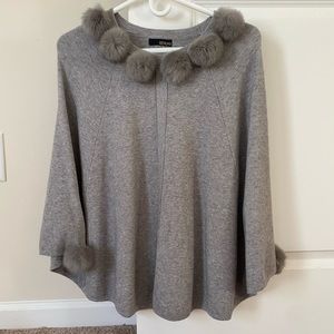 Renuar poncho with POM POM detail. Size S